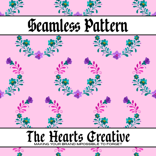 Pink, purple, and teal floral stitching on a seamless pink background